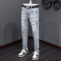 Thời trang mới nhạt màu xanh nam quần jean nút placket sơn đục lỗ vá đàn hồi mỏng vừa vặn retro quần jean chất lượng cao