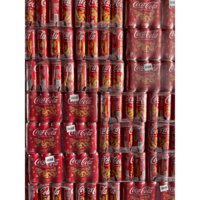 Thùng 24 lon nước ngọt Coca-Cola nguyên bản mẫu xuân 2024