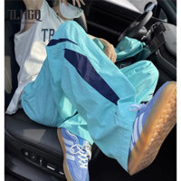 TLHGQ Mùa hè mỏng nhanh khô lính dù thể thao ống rộng Mỹ quần yếm màu xanh dopamine