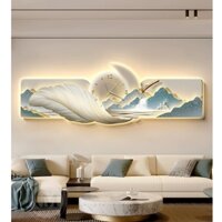 Tranh treo tường đồng hồ đèn led lông vũ và núi non kèm đinh treo