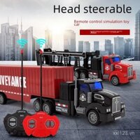 Trẻ em điều khiển từ xa xe sơ mi rơ moóc đồ chơi RC xe tải điện mô phỏng xe tải có thể sạc lại xe tải container mới TQSQ