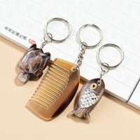 Tự Nhiên Thật Yak Sừng Lược Móc Khóa Cổ Mini Di Động Dễ Thương Sáng Tạo Lược Nhỏ Xe Mặt Dây Chuyền Nam Nữ Phong Cách