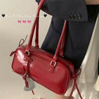 Túi đeo vai cầm tay màu đỏ bóng đính nơ Red Story