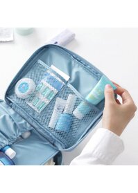 Túi đựng mỹ phẩm xanh họa tiết hoa