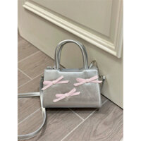 Túi xách nữ màu bạc có quai xách phối nơ cực xinh