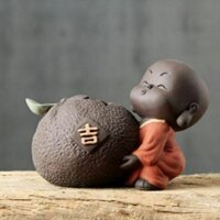Tượng chú tiểu ôm chậu- tượng trồng cây