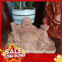 Tượng di lặc bằng gỗ xá xị để xe ô tô