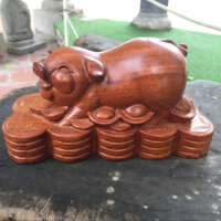 Tượng heo bằng gỗ hương nguyên khối