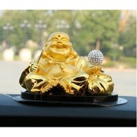 tượng Phật Di Lặc cầm quạt để taplo xe hơi chạy năng lượng, tượng phong thủy oto - DL3 còn ít H