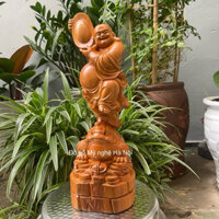 Tượng Phật di lặc dâng vàng gỗ thơm cao 40 cm