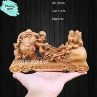 Tượng phật di lặc kéo bao nhất phúc dài 20cm chất liệu gỗ bách xanh