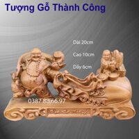 Tượng phật di lặc kéo bao nhất phúc dài 20cm chất liệu gỗ bách xanh nguyên khối
