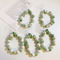 [Tỷ lệ khen ngợi 91%] Vòng tay thủ công đính cườm ngọc trai xanh tươi nhỏ có thẻ Vỏ điện thoại Dây đeo cổ tay chống sốc đa năng Mang theo tay Chống thất lạc