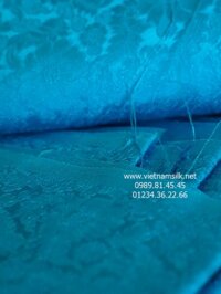 Vải may áo dài lụa tơ tằm họa tiết hoa cúc xanh ngọc đậm.VL.C122