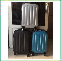 vali nhựa cứng 4 bánh xe xoay, size xách tay 20inc màu xám bạc