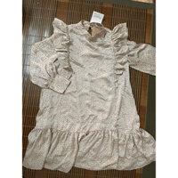 Váy be chấm bi cam Hàn Quốc