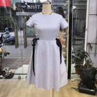 Váy đầm liền xoè kẻ caro buộc nơ eo
