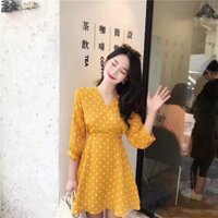 Váy dáng xoè chấm bi vàng