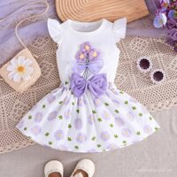 Váy hoa nơ định vị màu tím với in hoa cúc nhỏ và tay áo xếp nếp