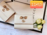 Ví Nữ Cầm Tay GUCCI Màu Trắng Kem Nơ