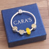 Vòng charm đá mã não vàng