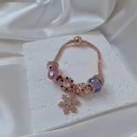 Vòng tay charm bông tuyết đá năng lượng mầu vàng hồng