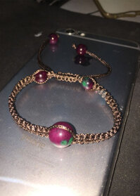 Vòng tay đá ruby nam phi tết dây sẵn 10mm