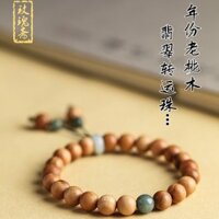 Vòng tay hạt chuyển gỗ đào cũ