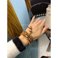 Vòng tay trầm hương thiên nhiên 6ly 108 hạt mix charm bạc mạ vàng Lu thống khắc chú om mani