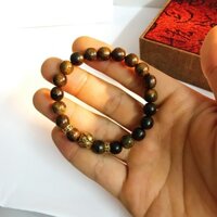 Vòng tay trầm hương việt hoa sen phật  chiêu trí tuệ mạ vàng non 18k