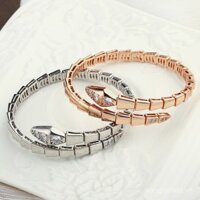 Vòng Tay Xương rắn lò xo mới mở sống 18K vàng bạc (chất liệu: Thép Titan) không phai màu