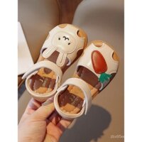 Xăng đan bít mũi bé gái giày công chúa khoét lỗ trẻ em mẫu mới mùa hè 2025 Giày tập đi thỏ đế mềm bé gái sành điệu