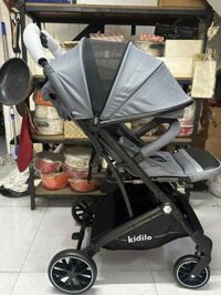 Xe đẩy em bé Kidilo gấp gọn thanh lý ( trưng bày)