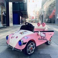 Xe ô tô điện trẻ em Hello Kitty - Xe có điều khiển từ xa, có bàn chân ga, có nhạc, có đèn