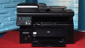 So sánh máy in laser đen trắng có photo, scan, fax HP LaserJet Pro M1212nf và Canon MF4750