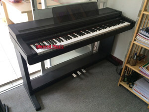 Đàn piano Kawai PC330