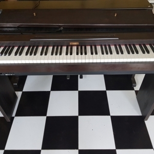 Đàn piano Kawai PE-3