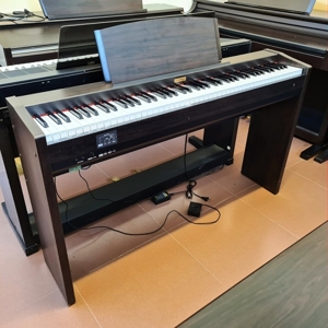 Đàn piano Kawai PE-3