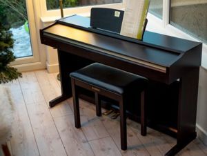 Đàn Piano Yamaha CLP-115