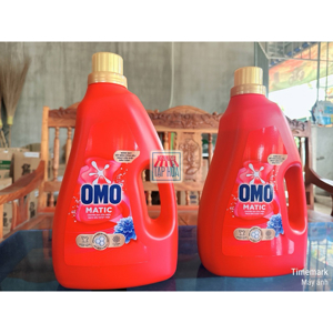 Nước giặt OMO Matic máy giặt cửa trên chai 2.7KG